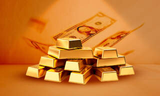 Debilidad del dólar impulsa al oro a nuevos máximos históricos, mientras esperan la decisión de la Fed